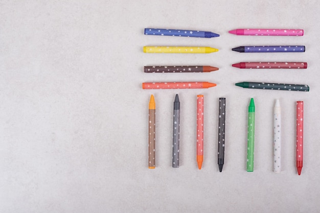 Free photo colorful crayons on white background