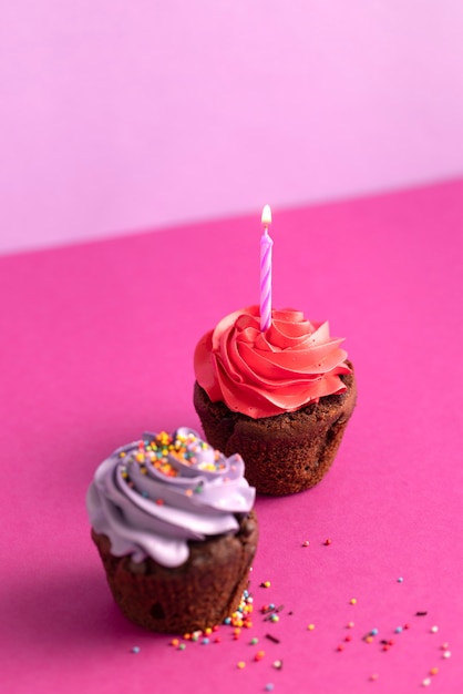 Free Photo colorful delicious cupcakes covered in frosting