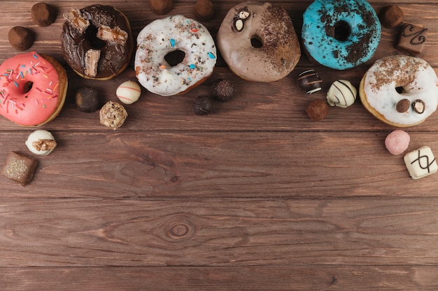 Colorful donuts with chocolate