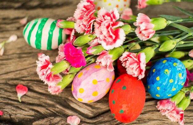 Colorful easter eggs and branch with flowers