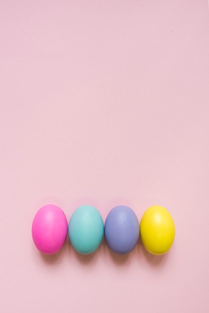 Colorful Easter eggs on table