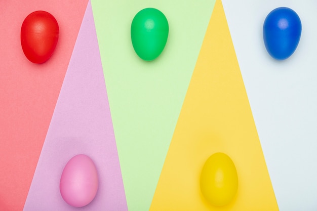 Colorful eggs painted on table