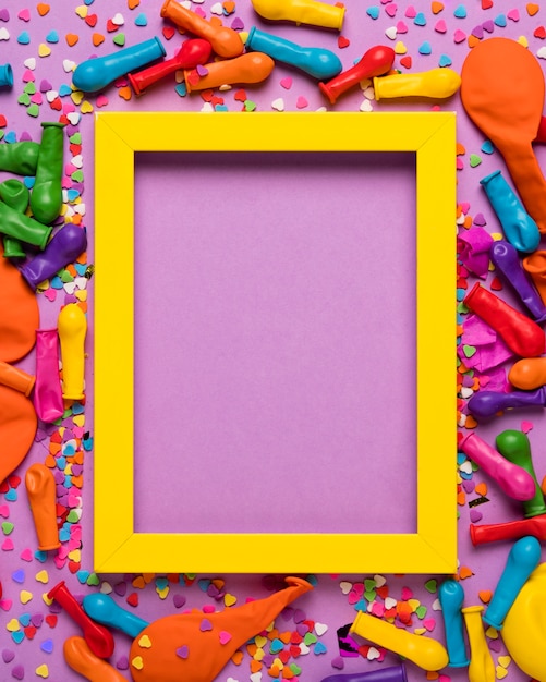 Free Photo colorful festive objects with yellow empty frame