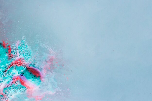 Colorful foam on light water