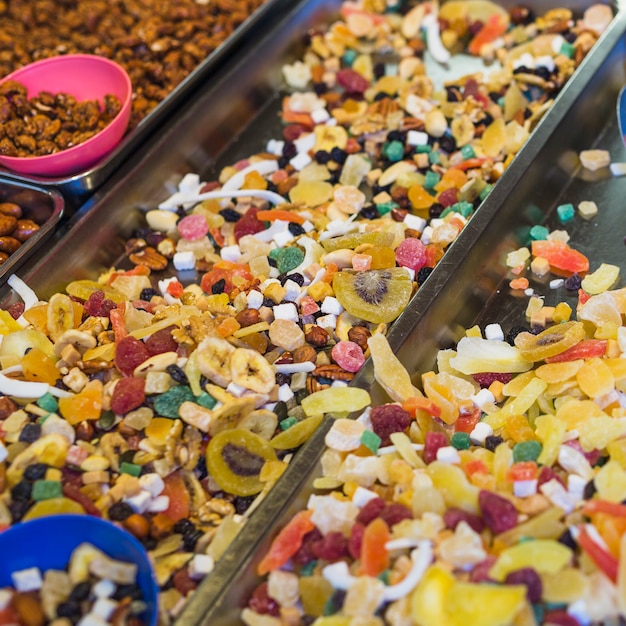 Free Photo colorful fruits candies in the container for sale