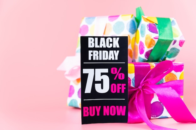 Free photo colorful gifts with black friday tag