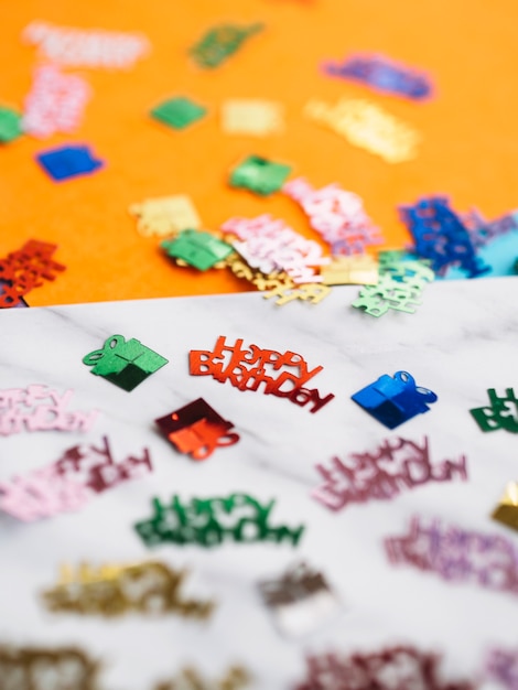 Free Photo colorful happy birthday words confetti