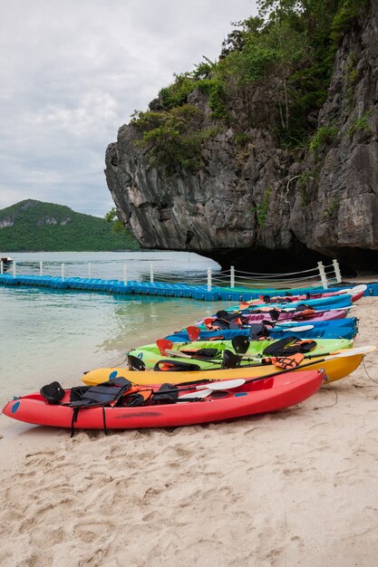 Colorful kayaks on beach