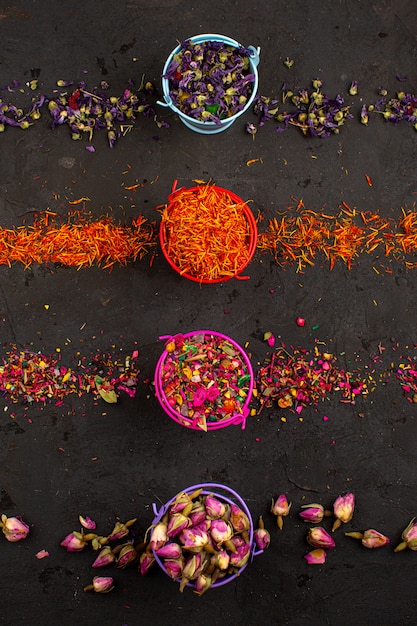 Colorful leafs flower leafs spread all over the grey desk