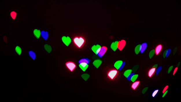 Free Photo colorful lights background with hearts