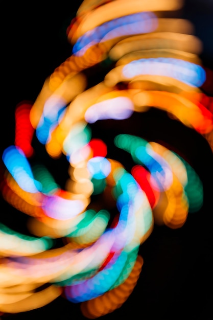 Colorful lights swirling on black