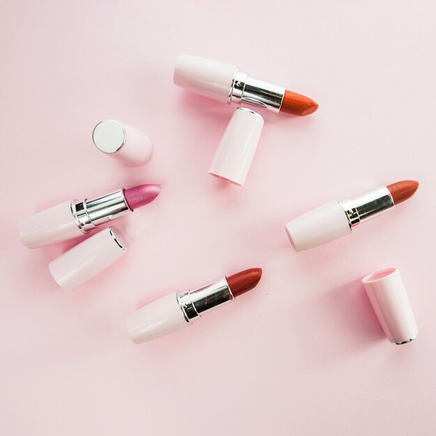 Colorful lipsticks in white tubes