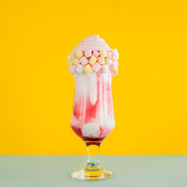 Colorful milkshake with marshmallows