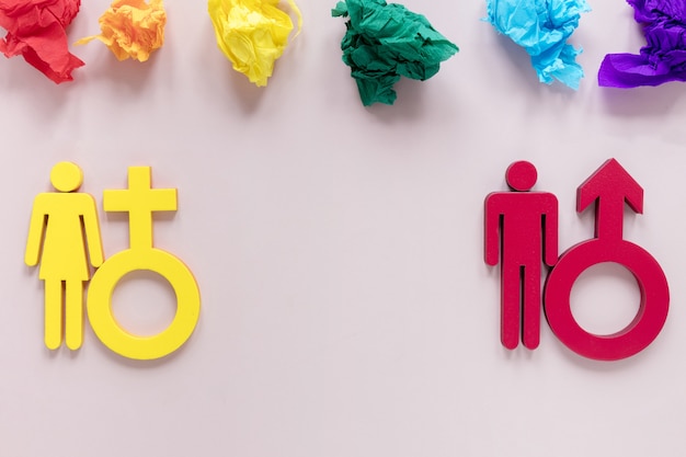 Free photo colorful motolite paper with gender symbols