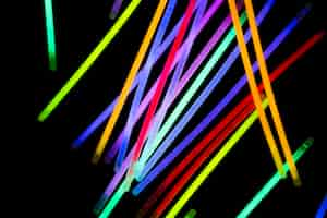 Free photo colorful neon tubes on dark background