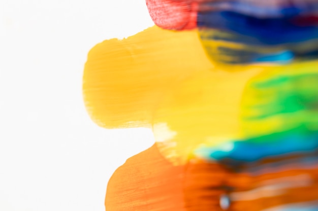 Colorful paint strokes on white background