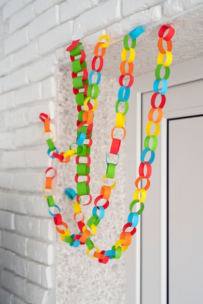 Free photo colorful paper chains still life