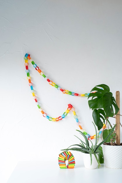 Free photo colorful paper chains still life