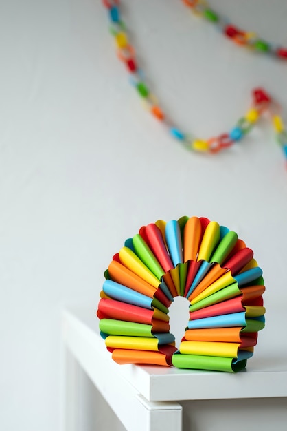 Free photo colorful paper chains still life