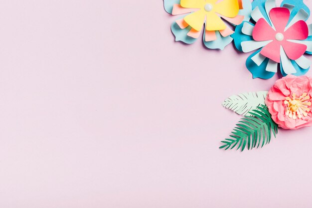 Colorful paper spring flowers with copy space