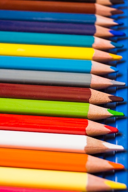 Colorful pencils in row