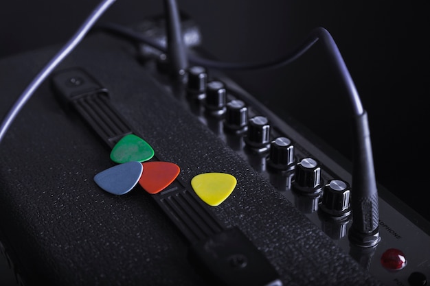 Free photo colorful picks on amplifier