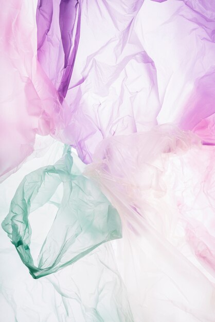 Colorful plastic bags on white background