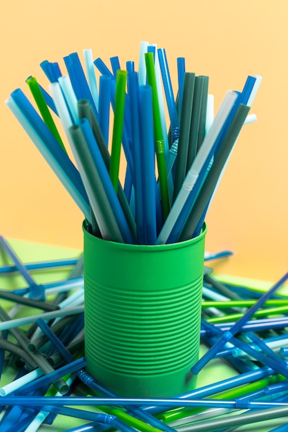 Colorful plastic straw collection in can