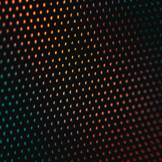 Free photo colorful polka dot textile closeup