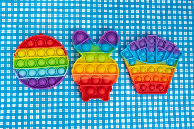 Free Photo colorful pop it toy over background - close up