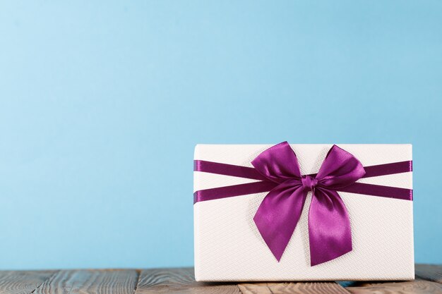 Colorful present on blue