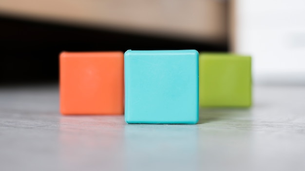 Free photo colorful set of cubes on floor