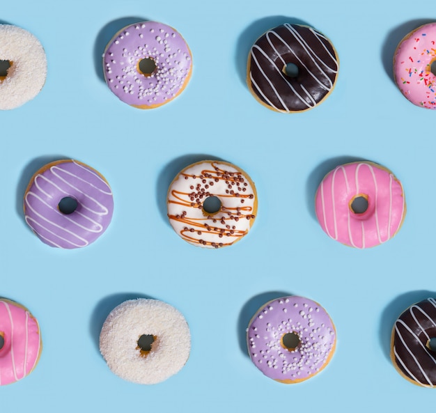 Free photo colorful sweeties donuts, pattern composition