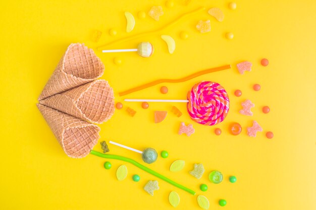 Colorful sweets near cones