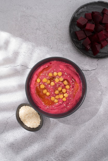 Colorful and tasty hummus with ingredients