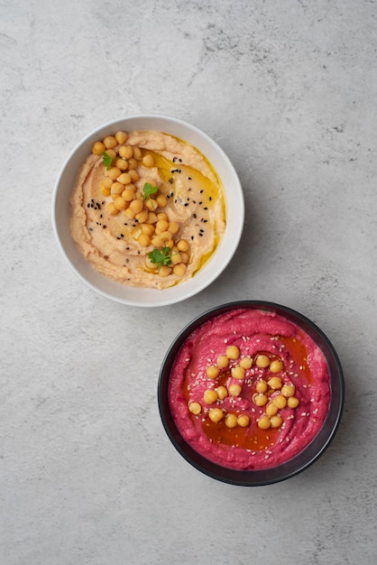 Free photo colorful and tasty hummus with ingredients