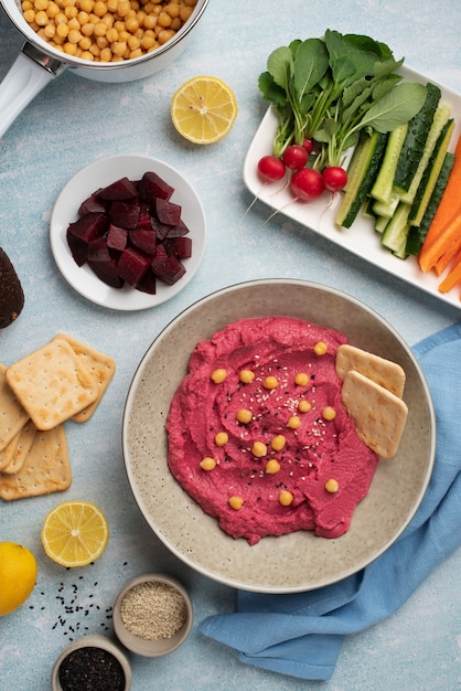 Colorful and tasty hummus with ingredients