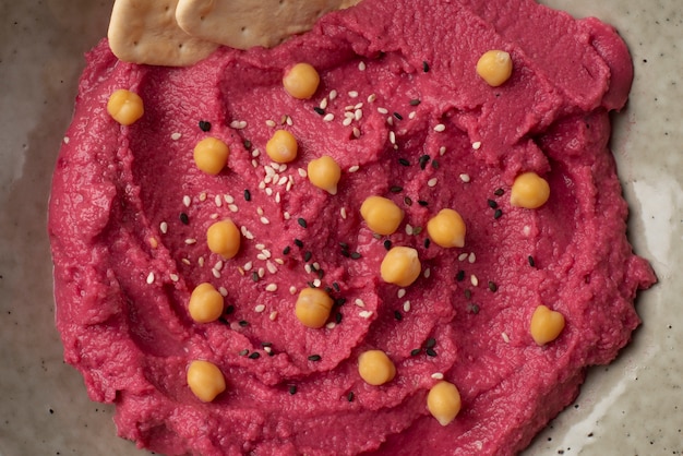 Colorful and tasty hummus with ingredients