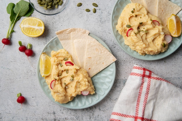 Colorful and tasty hummus with ingredients