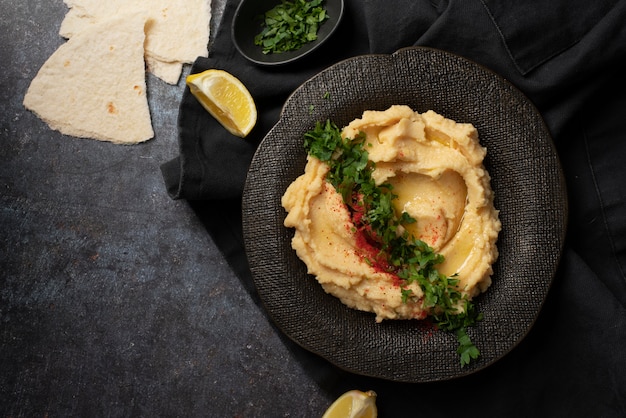 Colorful and tasty hummus with ingredients