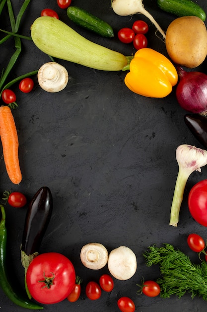 Colorful vegetables fresh vegetables such as yellow bell pepper and others on grey desk