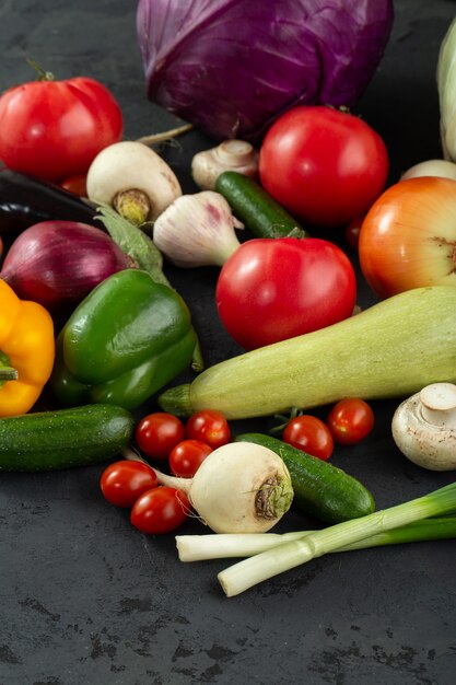 Colorful vegetables fresh vitamine riched colored vegetables on dark background