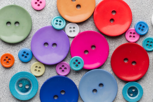 Coloured sewing buttons composition close-up