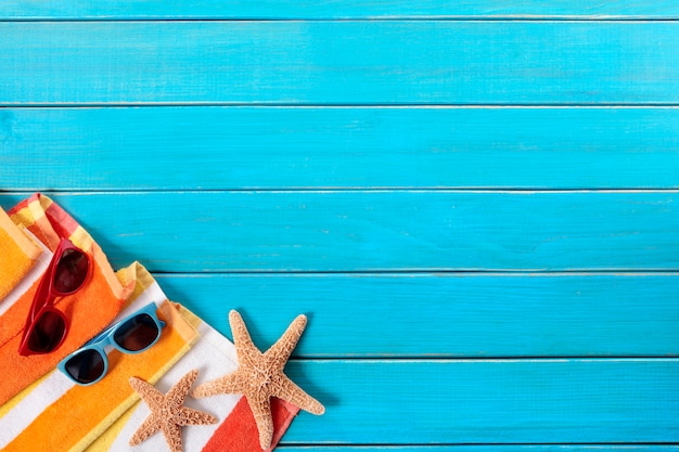 Free Photo coloured towel above a blue plank