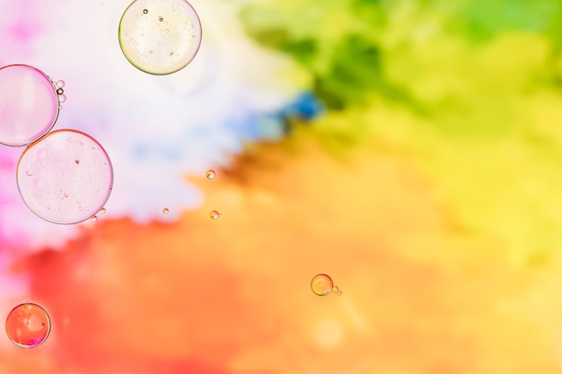 Free Photo colourful background with transparent bubbles