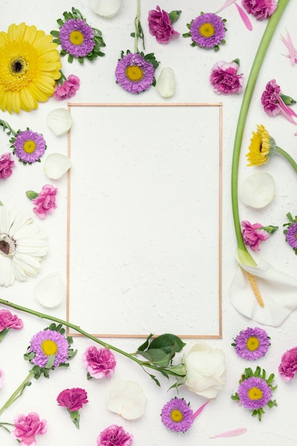 Free photo colourful festive flowers background with vertical frame copy space