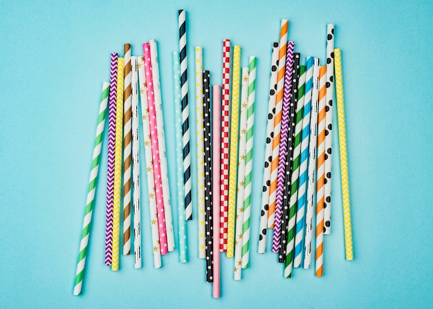 Colourful paper straws copy space