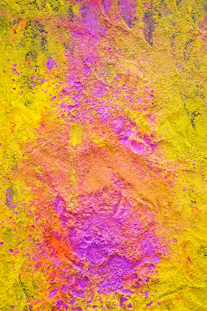 Free photo colourful yellow powder on table