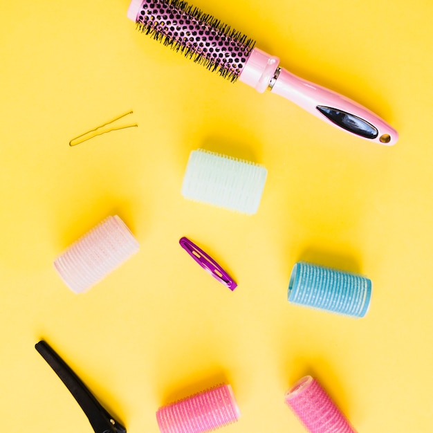 Comb and rollers on yellow