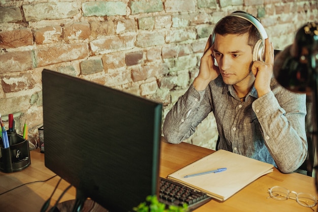 Free Photo communication. man working from home, remote office concept.